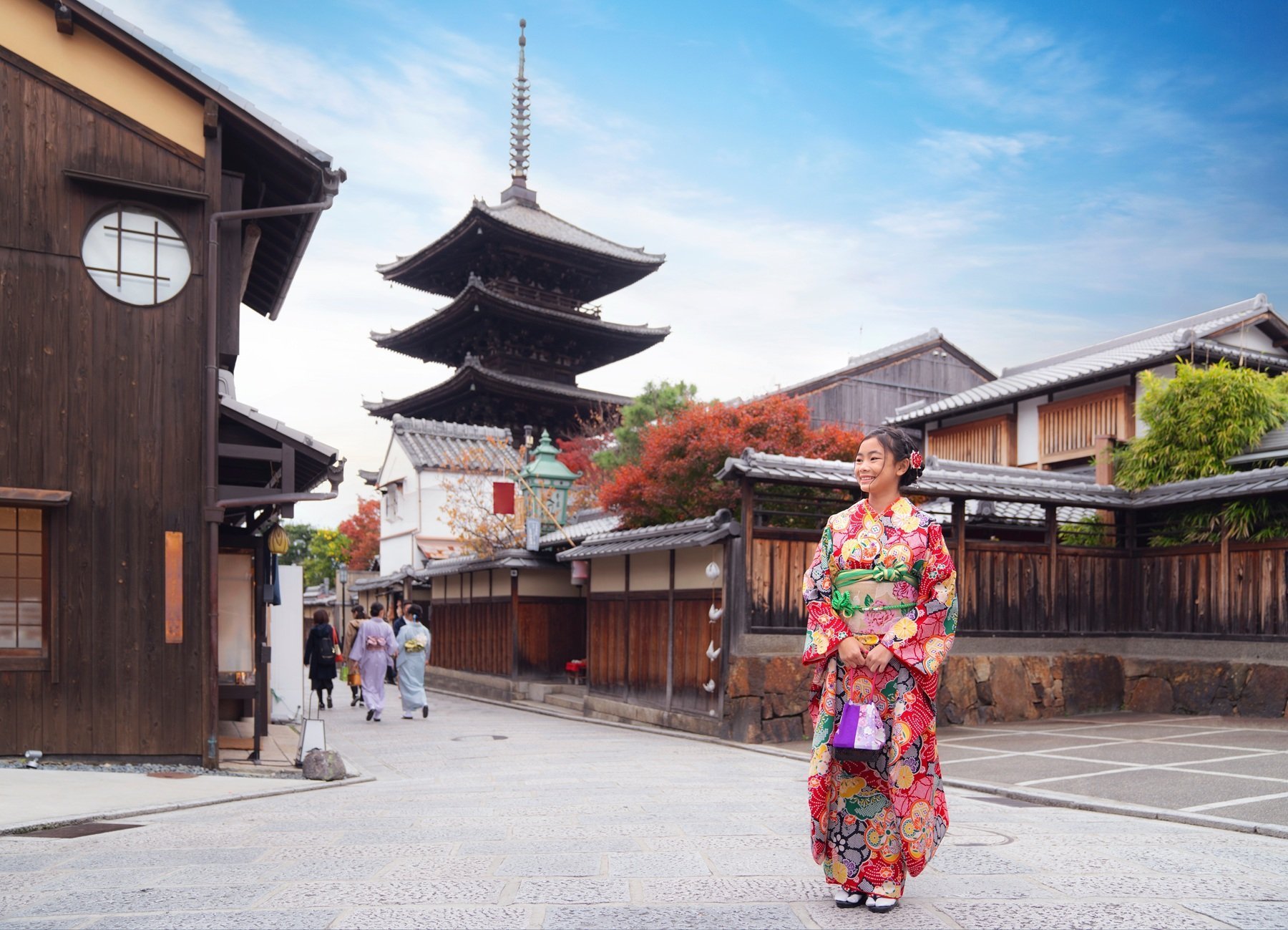 Women In Traditional Kimono In The Streets Of Gion Kyoto