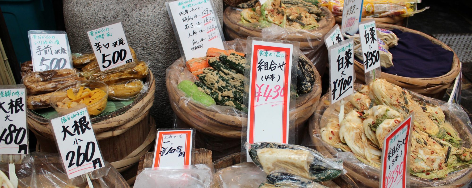 Discover The Stands Of Kuromon Market On Your Osaka Market Tour And Cooking Class Scaled 1