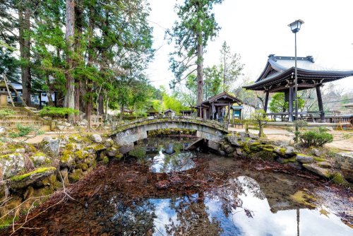 Higashiyama Promenade With Small Lake Surrounded By Trees