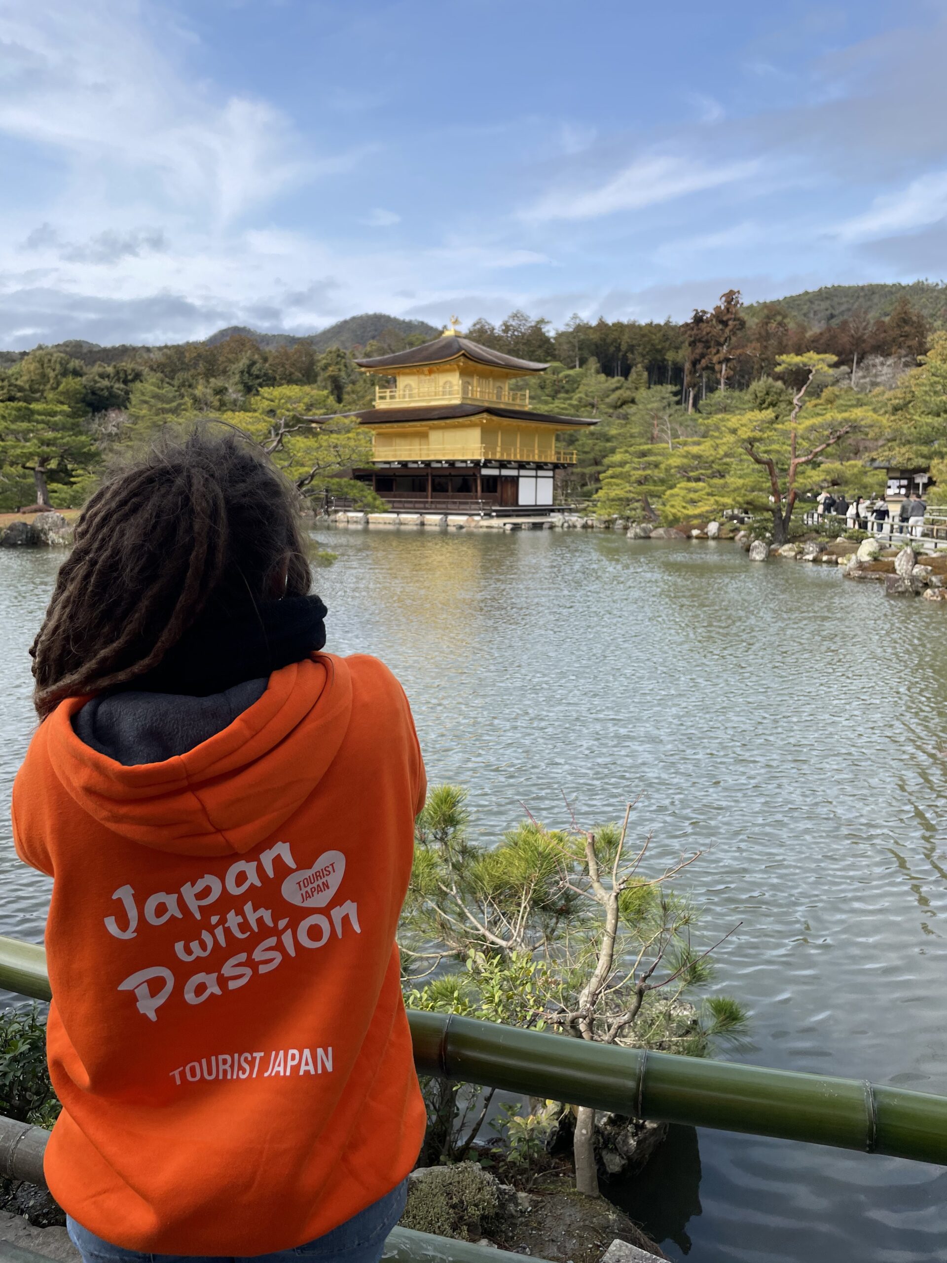 Tourist Taking A Photo Ot Kinkakuji Pavilion In Kyoto