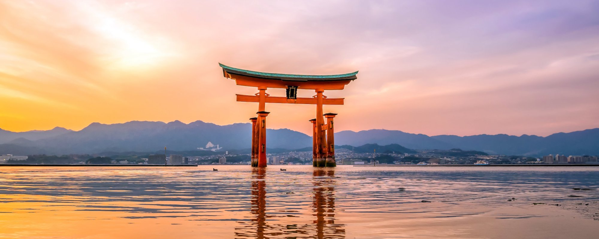 Famous Floating Torii Gate In Japan At Sunset