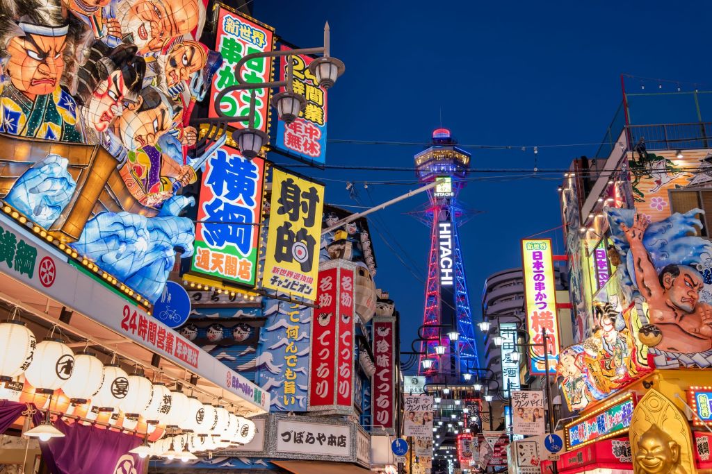 Colorful Billboards At Night In Shinsekai The Renowned Culinary District Of Osaka Japan