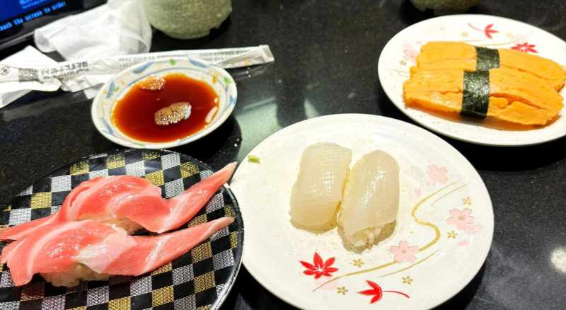 Up Close Photograph Of A Range Of Japanese Food On A Table.